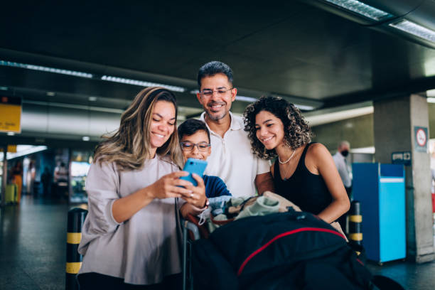 family at the airport getting a car ride